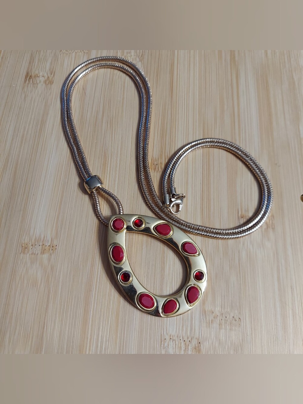 Textured Gold Tone/Faceted-Beveled Red Cut Crystal Open Teardrop Pendant Necklac